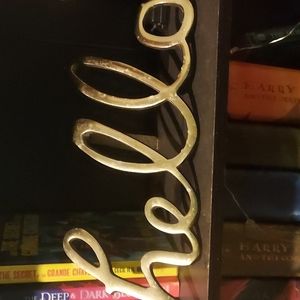 A home decor sign that says hello